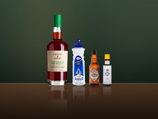 Savage & Cooke Grenache Cask Rye, simple syrup, Bitter Truth orange bitters and Angostura on a dark bar top