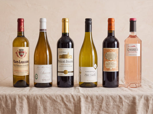 The France Case — six French bottles across six regions on linen