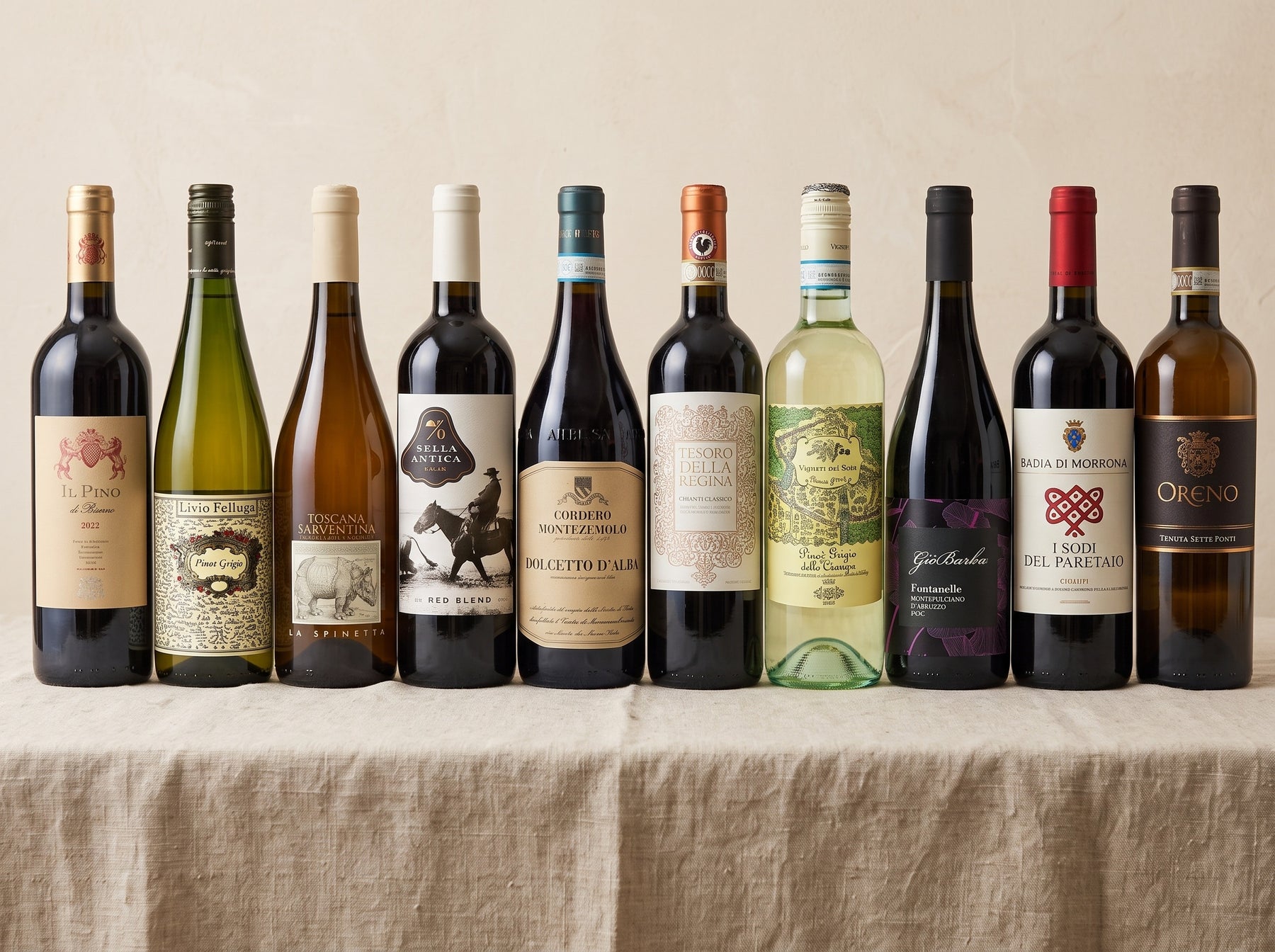 The Italy Case — ten Italian wine bottles on a linen table
