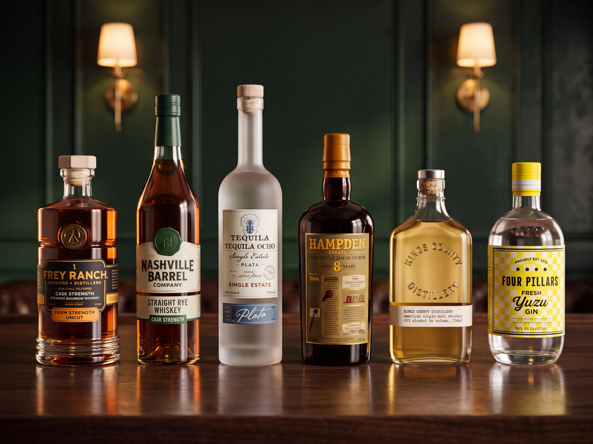 The Pro Bar Kit: Frey Ranch cask strength bourbon, Nashville Barrel rye, Tequila Ocho Plata, Hampden Estate 8 year rum, Kings County single malt and Four Pillars yuzu gin on a bar